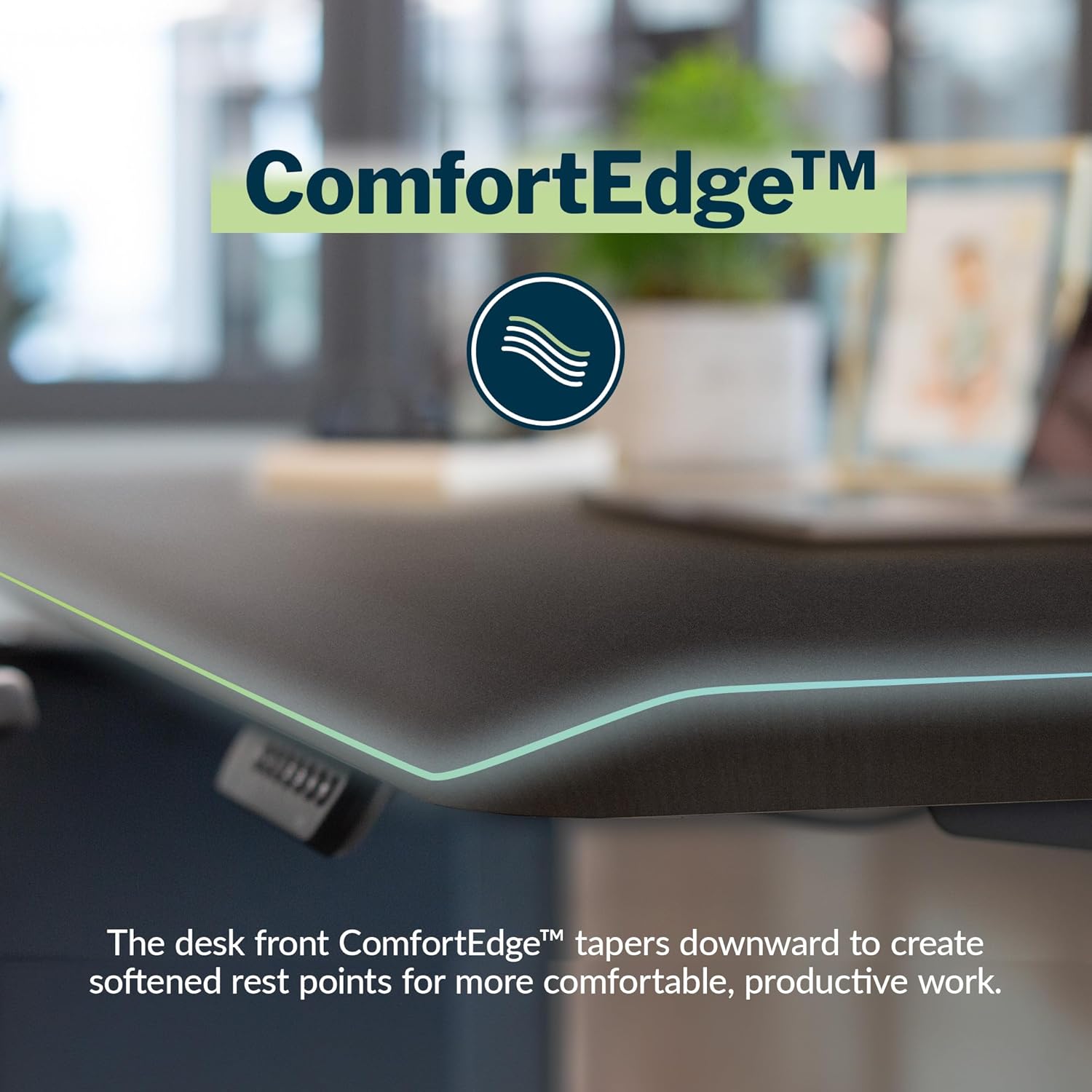 Large black electric standing desk with height-adjustable frame and sloped edge design — view 3