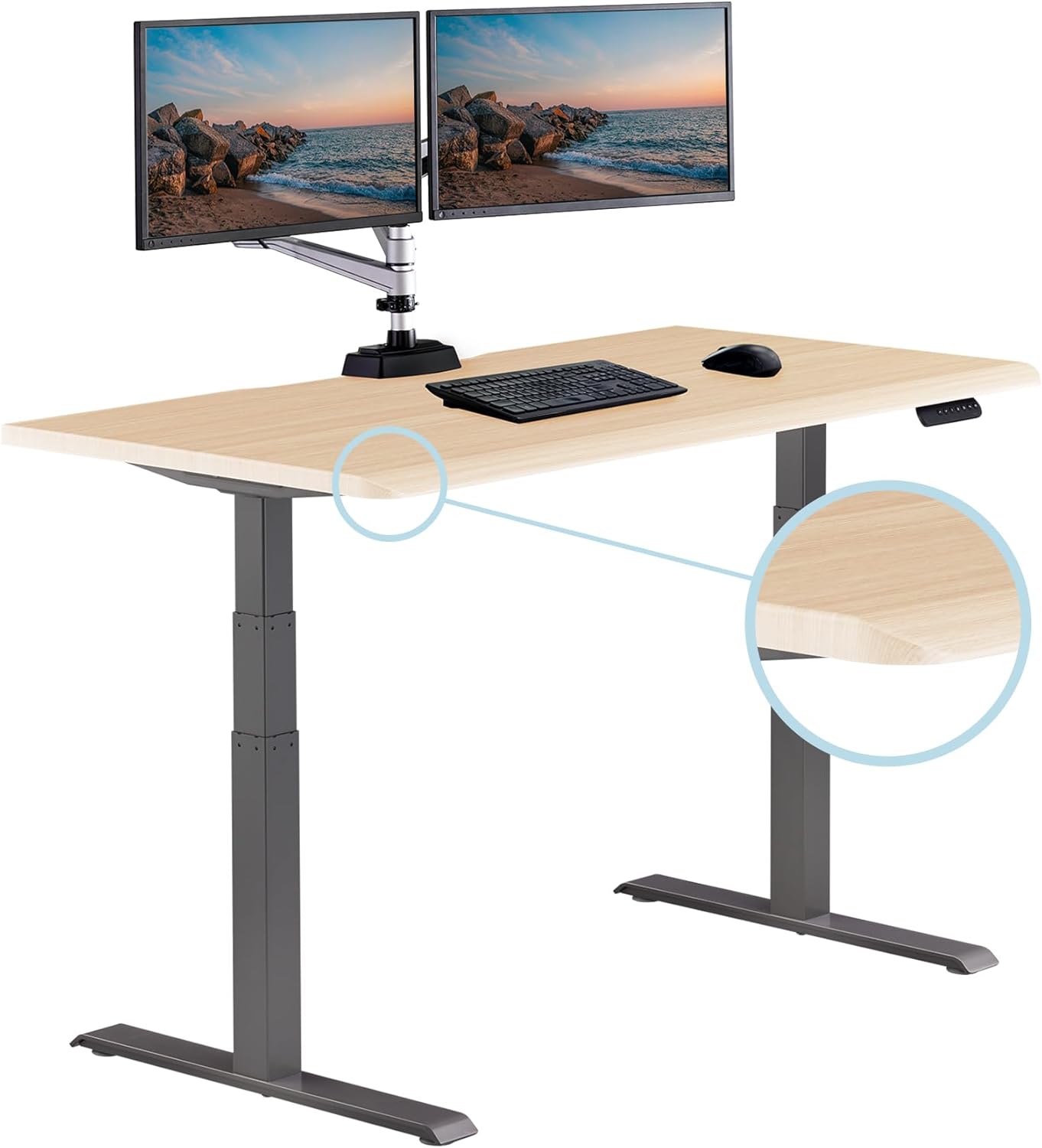 Large black electric standing desk with height-adjustable frame and sloped edge design — view 3b