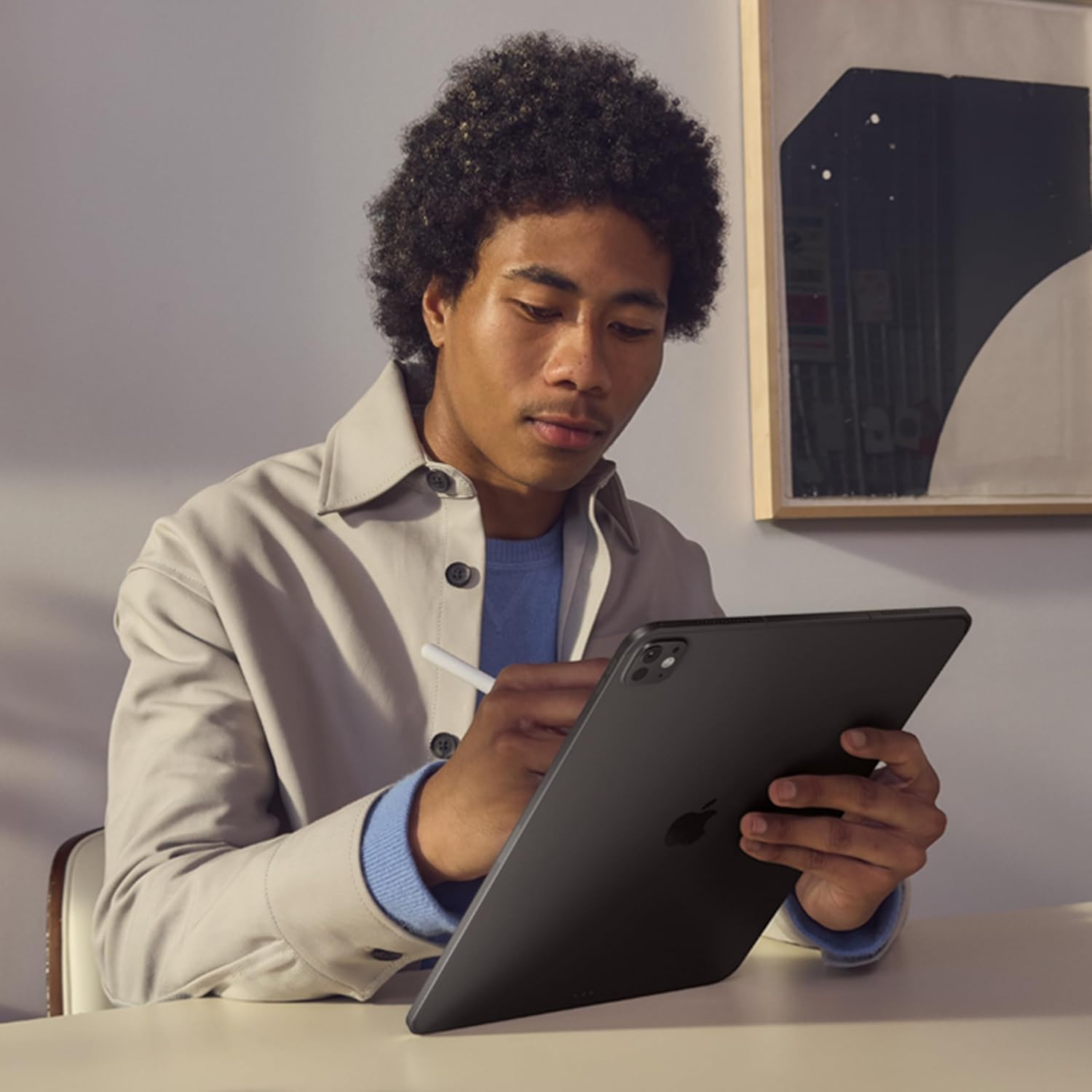 Apple iPad Pro 13-inch tablet with Ultra Retina XDR display in Space Black, shown from front and back angles displaying 12MP cameras — view 4