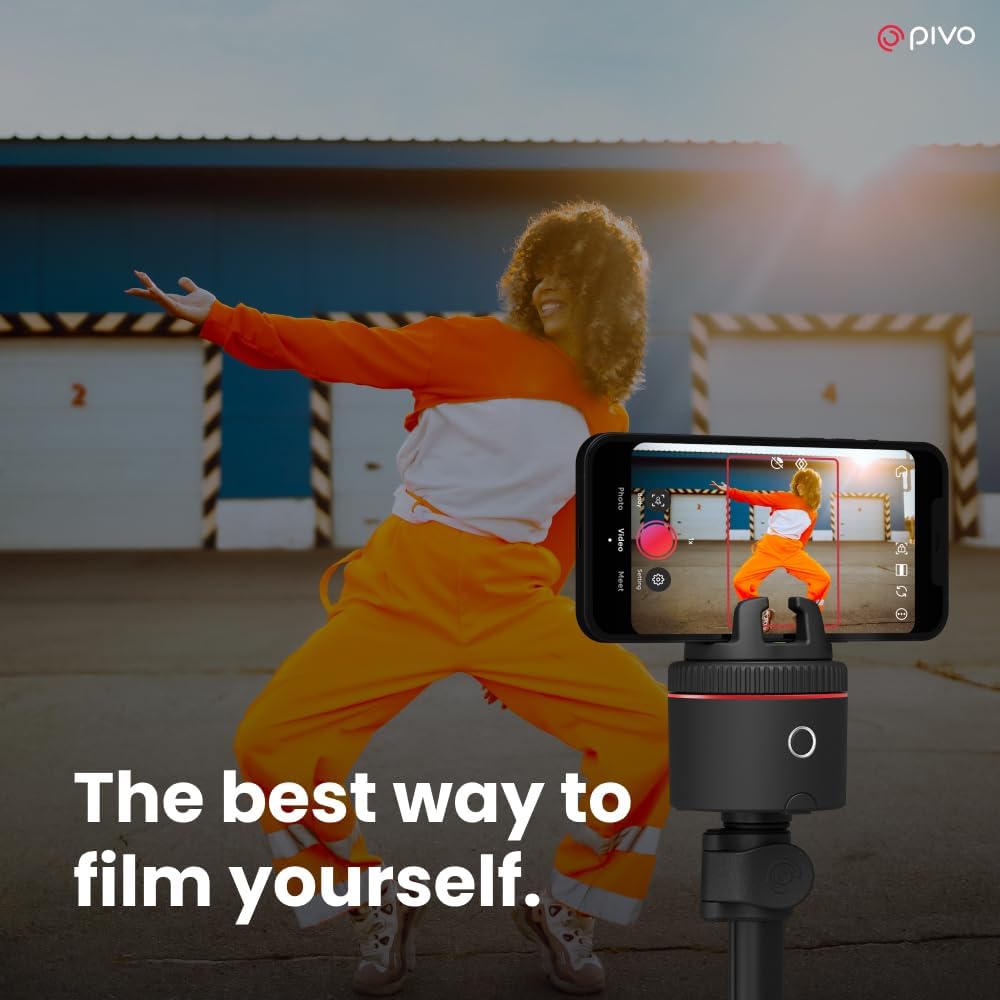 Auto-tracking phone holder with 360° rotation and sleek black finish, showing mounted smartphone during video recording — detail