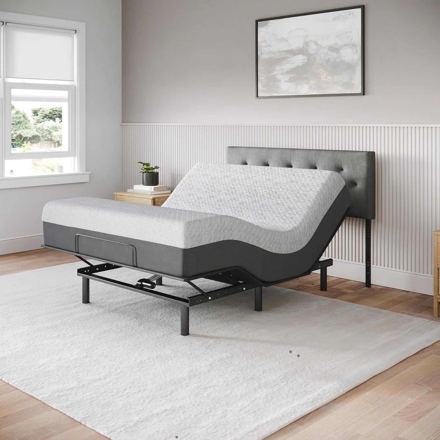 Adjustable bed frame with lifted head section, full-size gel memory foam mattress in firm support โ front