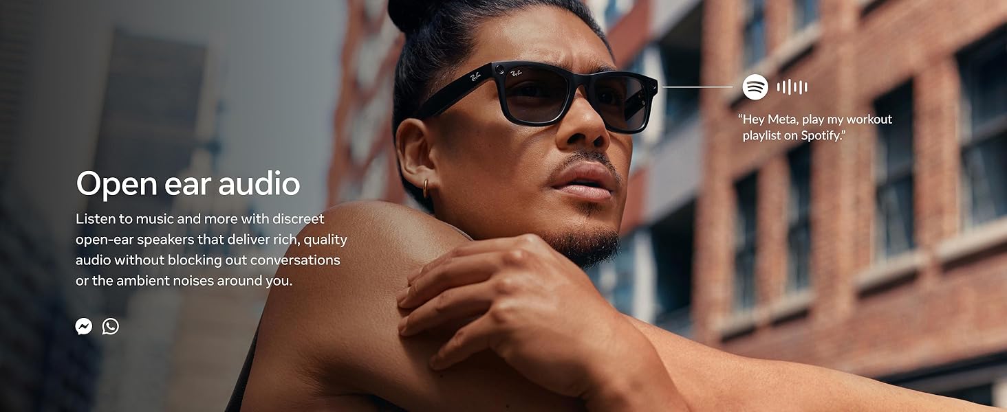 Smart glasses with matte black Wayfarer frame, Transitions graphite green lenses, and built-in camera โ view 7b