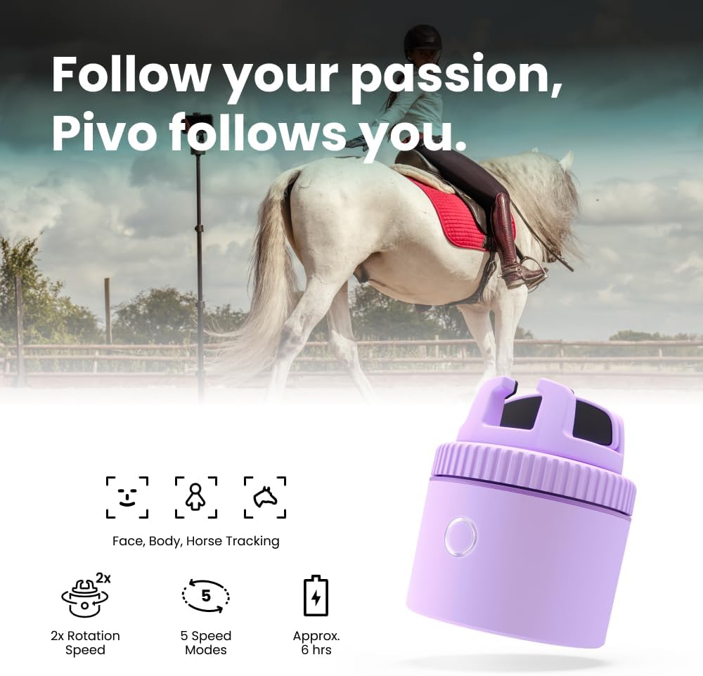 Purple auto-tracking phone holder with 360° rotation mounted on stand, showing remote control and tracking indicators — view 2